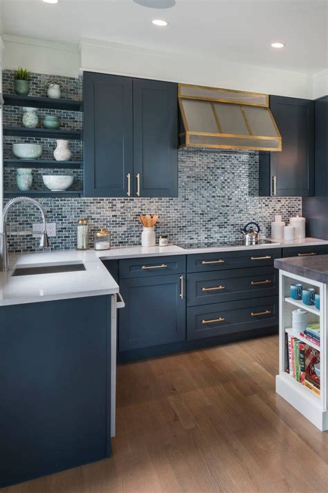 blue cabinets with quartz countertops.